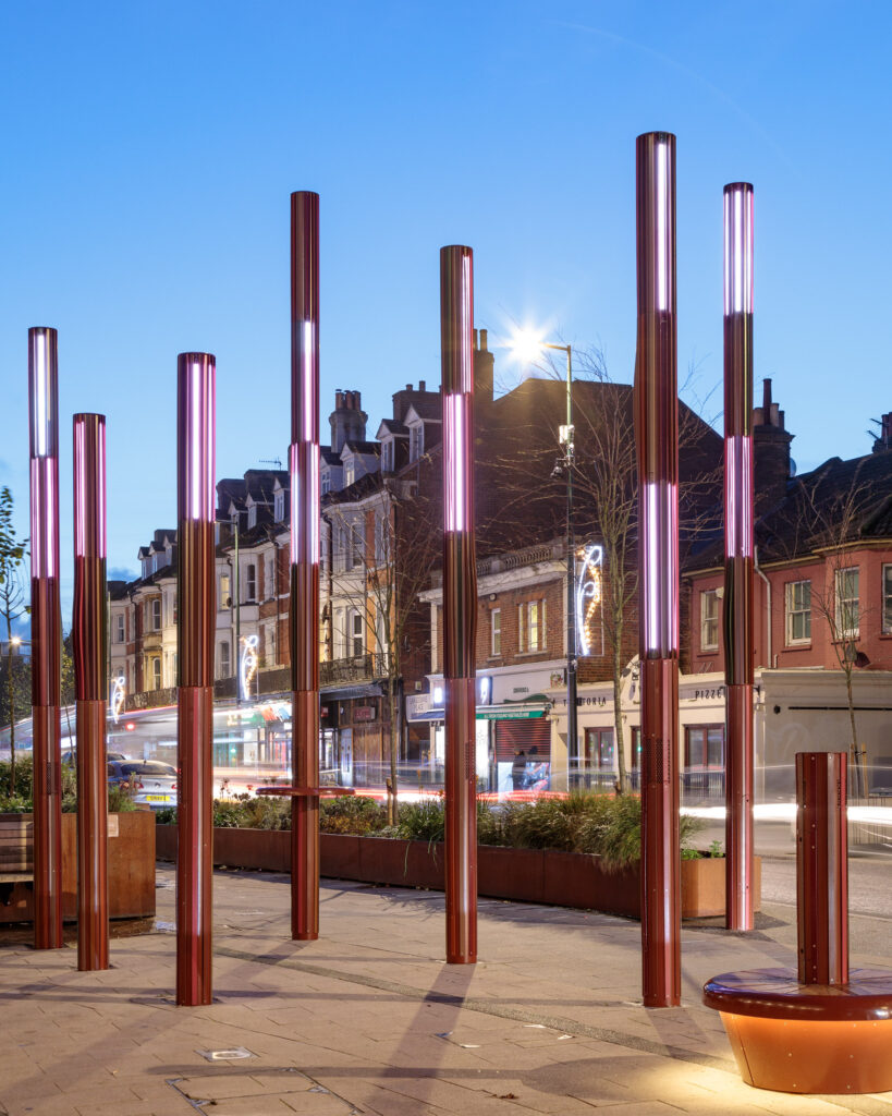 street lighting columns with integrated speaker system on the street